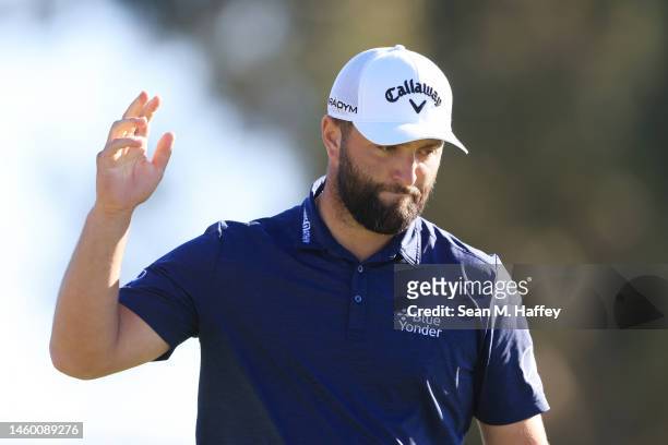 Jon Rahm of Spain reacts after a putt on the 15th green of the South Course during the third round of the Farmers Insurance Open at Torrey Pines Golf...