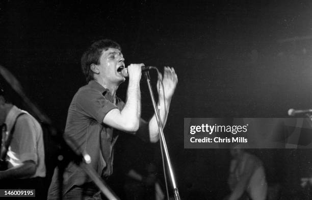 Ian Curtis of Joy Division performs on stage at the Rainbow Theatre, London, 4th April 1980.