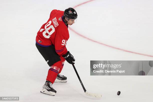 Forward Connor Bedard of the Regina Pats fires a slapshot for team Red during the 2023 Kubota CHL Top Prospects Game at the Langley Events Centre on...