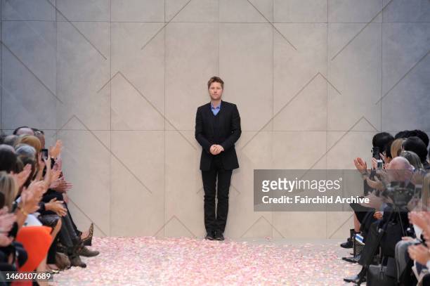 Fashion designer Christopher Bailey on the runway after Burberry Prorsum's spring 2014 show.