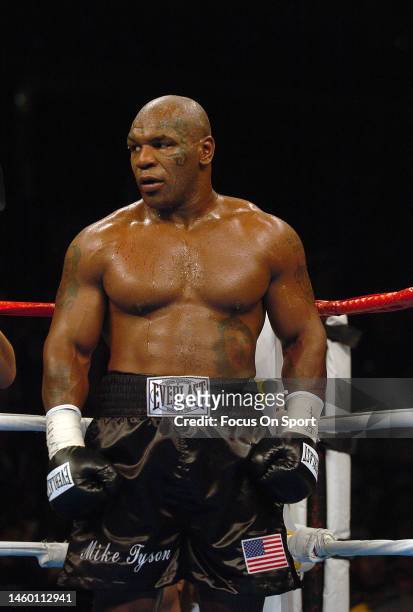 Heavyweight Mike Tyson, black trunks looks on from his corner during his heavyweight fight against Kevin McBride on June 11, 2005 at the MCI Center...