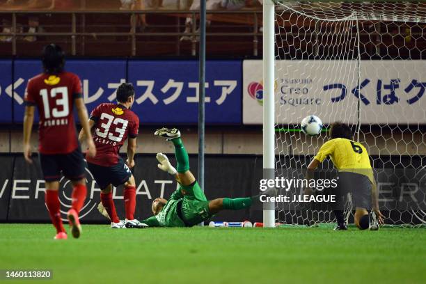 Renato Caja of Kashima Antlers scores the team's second goal past Takanori Sugeno of Kashiwa Reysol during the J.League Yamazaki Nabisco Cup semi...