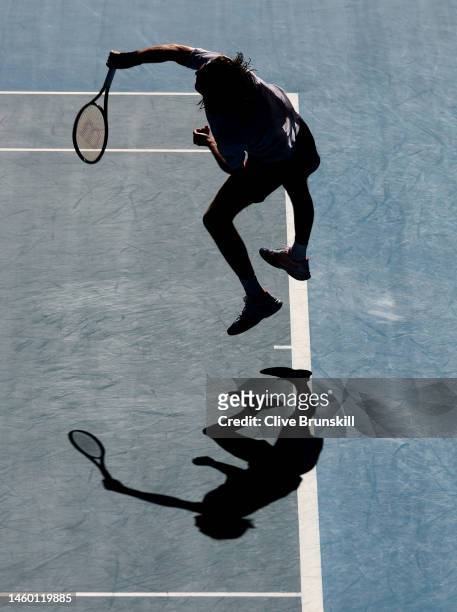 Stefanos Tsitsipas of Greece serves in the Semifinal singles match against Karen Khachanov during day 12 of the 2023 Australian Open at Melbourne...