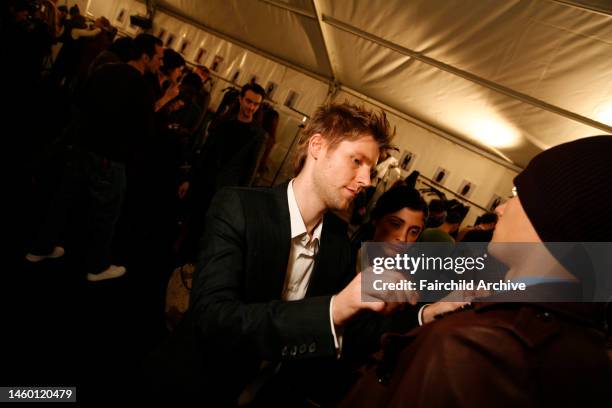 Fashion designer Christopher Bailey backstage at his Burberry Prorsum fall 2006 menswear show.