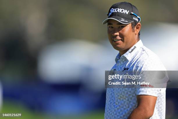 Hideki Matsuyama of Japan looks on from the first hole of the South Course during the third round of the Farmers Insurance Open at Torrey Pines Golf...