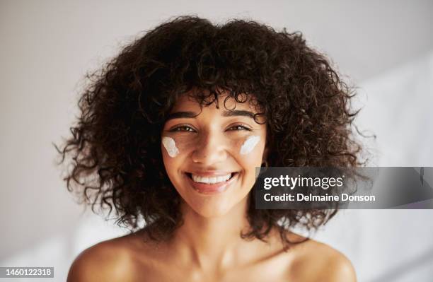 black woman, beauty portrait and skincare cream or dermatology cosmetics product. face and smile of a happy model in studio for skin glow, natural hair and self care facial collagen cosmetic lotion - beauty woman glow face stock pictures, royalty-free photos & images