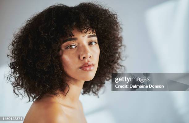 portrait, beauty and mockup with a black woman in studio to promote natural skincare or treatment. facial, skin and aesthetic with an attractive young female model inside for health or wellness - beauty woman glow face stock pictures, royalty-free photos & images