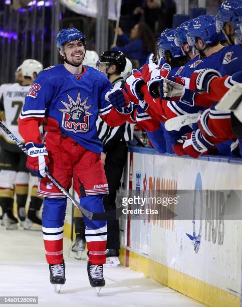Filip Chytil of the New York Rangers celebrates his goal with teammates on he bench in the third period against the Vegas Golden Knights at Madison...