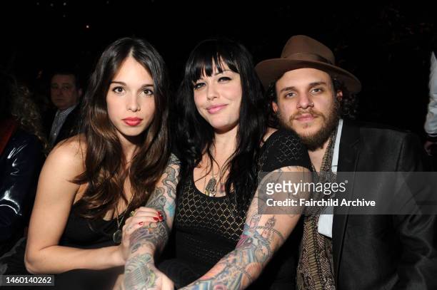 Chelsea Tyler, Mia Tyler and Jesse Kotansky attend Tommy Hilfiger's fall 2012 runway show at the Park Avenue Armory.