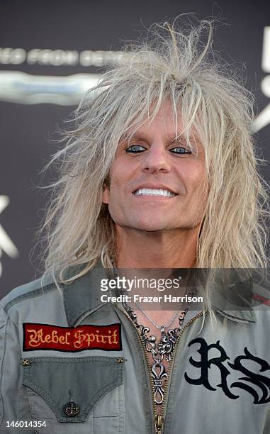 Musician C.C. DeVille arrives at the premiere of Warner Bros. Pictures' 'Rock of Ages' at Grauman's Chinese Theatre on June 8, 2012 in Hollywood,...