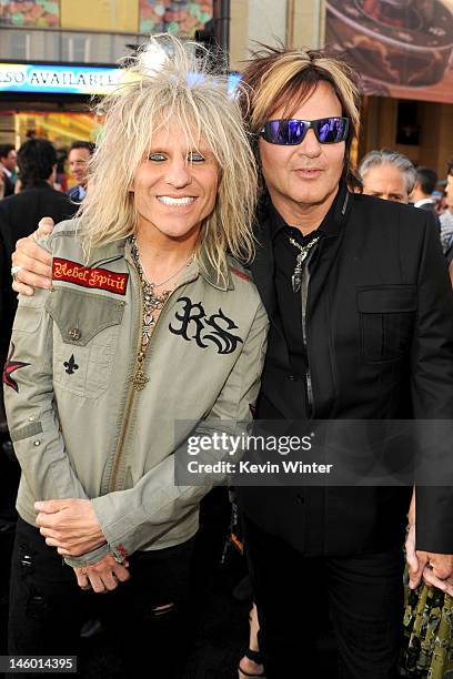 Musicians C.C. DeVille and Rikki Rockett of Poison arrive at the premiere of Warner Bros. Pictures' "Rock of Ages" at Grauman's Chinese Theatre on...