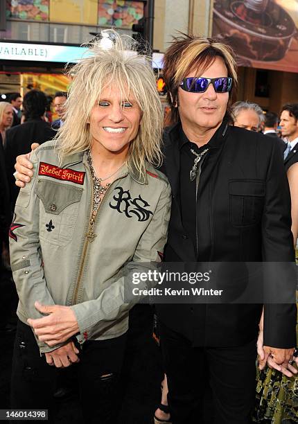 Musicians C.C. DeVille and Rikki Rockett of Poison arrive at the premiere of Warner Bros. Pictures' "Rock of Ages" at Grauman's Chinese Theatre on...