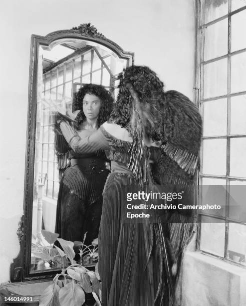 Argentine surrealist painter Leonor Fini at a masked costume ball at the Palazzo Labia, Venice, 3rd September 1951. Named 'Le Bal Oriental' and...