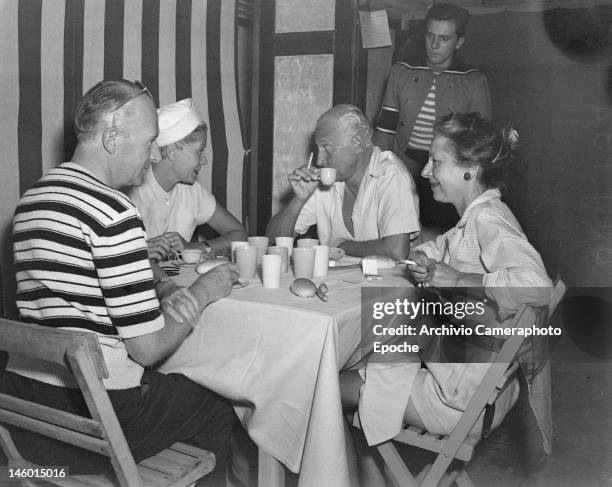 English photographer Cecil Beaton , Miss Wilson, Spanish-Mexican multi-millionaire Carlos de Beistegui and Lilian Ralli in Venice for a masked...