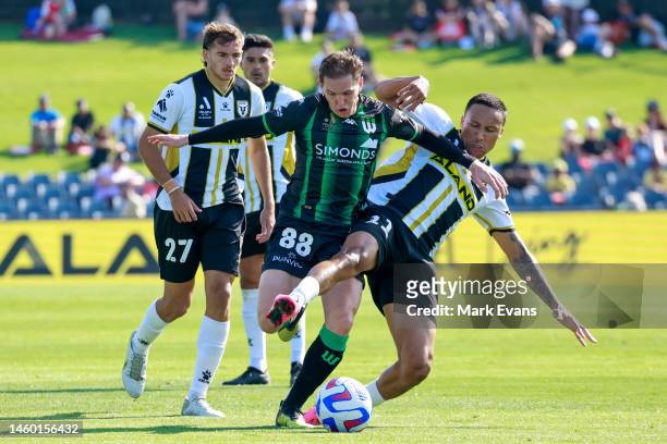 Kearyn Baccus of the Bulls and Neil Kilkenny of Western United compete for the ball during the round 14 A-League Men's match between Macarthur FC and...
