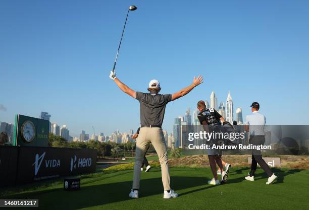 Sean Crocker of The United States celebrates after hitting the 8th hole fairway during the continuation of Round Two on Day Three of the Hero Dubai...