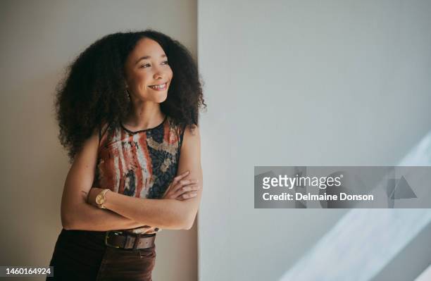 thinking, leader and black woman in office, happy and smile on a wall, mock up and background. idea, creative and business woman with motivation for small business, career and goal, confident and joy - woman smile stockfoto's en -beelden