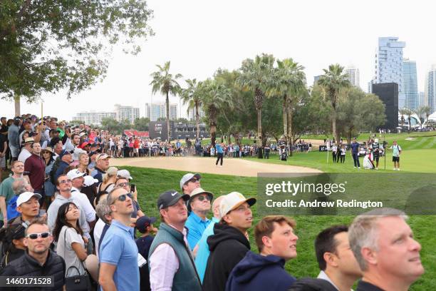 Ryan Fox of New Zealand plays their second shot on the 1st hole during the continuation of Round Two on Day Three of the Hero Dubai Desert Classic at...