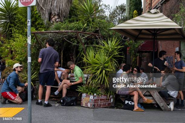 Groups of people sit at an outdoor bar and cafe on a hot summer day on January 28, 2023 in Melbourne, Australia. On July 6, 2022 the Australian...