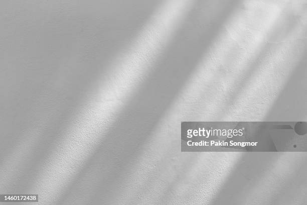 window shadow drop on white color old grunge wall concrete texture as background. - shadow stockfoto's en -beelden