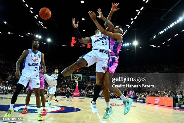 Rayjon Tucker of Melbourne United defends against Rayan Rupert of the New Zealand Breakers during the round 17 NBL match between New Zealand Breakers...