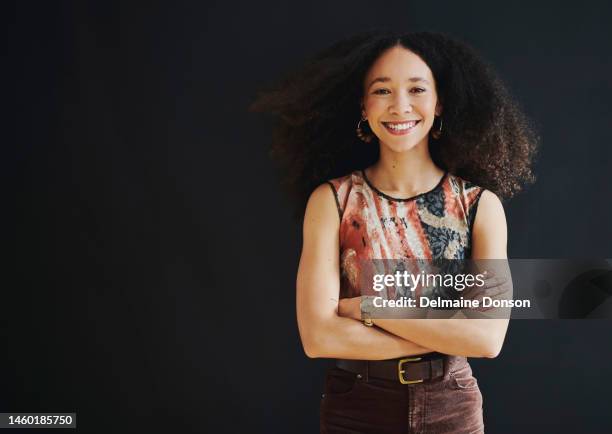 smile, proud and success black woman isolated on dark background in creative vision with mockup space. beautiful, trendy and fashion person in a portrait with arms crossed for empowerment mock up - portrait professional dark background stock pictures, royalty-free photos & images