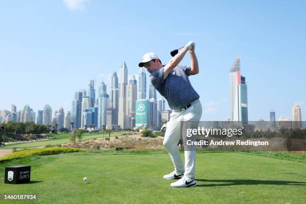 Robert MacIntyre of Scotland tees off on the 8th hole during the continuation of Round Two on Day Three of the Hero Dubai Desert Classic at Emirates...