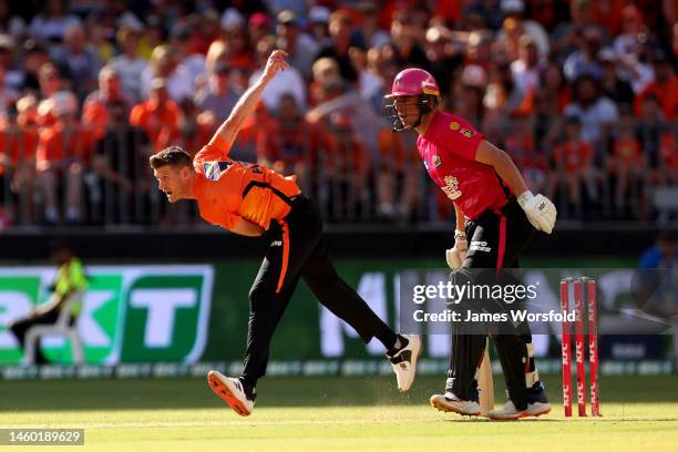 David Payne of the Scorchers follows through after his delivery during the Men's Big Bash League match between the Perth Scorchers and the Sydney...