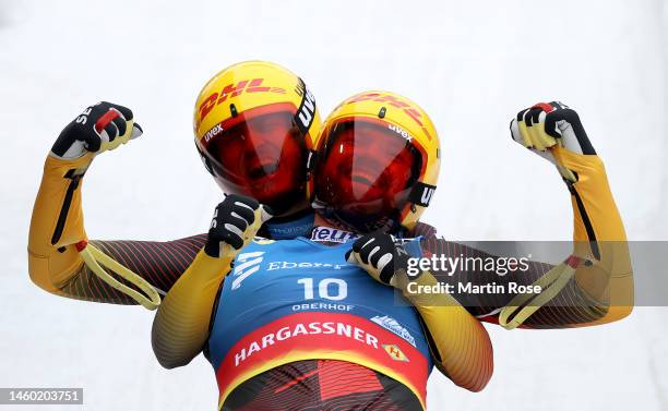 Toni Eggert and Sascha Benecken of Germany celebrate winning the gold medal during the Men's Doubles Run 2 during day 2 of the FIL Luge World...