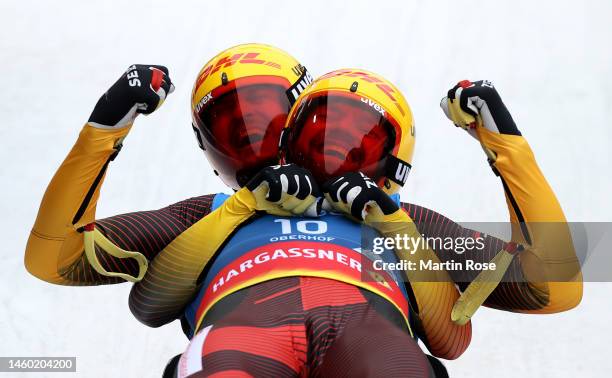 Toni Eggert and Sascha Benecken of Germany celebrate winning the gold medal during the Men's Doubles Run 2 during day 2 of the FIL Luge World...