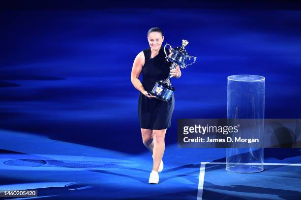 Ashleigh Barty carries the Daphne Akhurst Memorial Cup ahead of the Women’s Singles Final match between Elena Rybakina of Kazakhstan and Aryna...