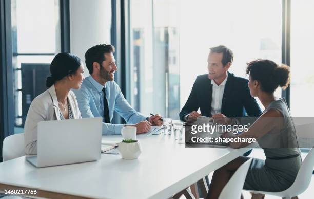 business, teamwork and meeting in office with manager, collaboration and startup agency. group, employees and corporate leadership at table for strategy, planning ideas and diversity of management - sales executive stockfoto's en -beelden