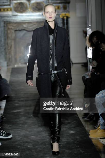 Model on the runway at Anthony Vaccarello's fall 2013 show at Hotel Salomon de Rothschild.