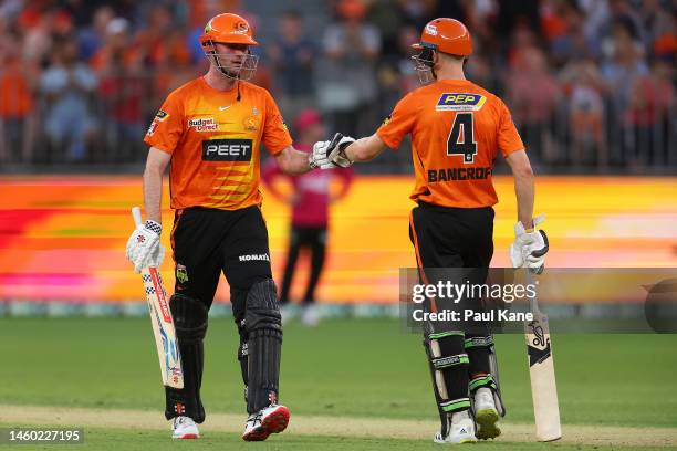 Ashton Turner and Cameron Bancroft of the Scorchers fist bump during the Men's Big Bash League match between the Perth Scorchers and the Sydney...