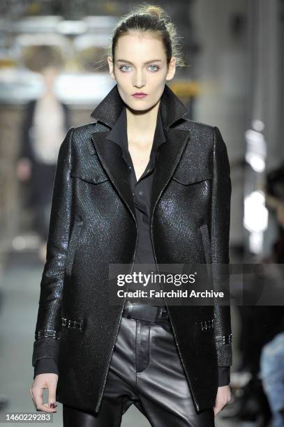 Model on the runway at Anthony Vaccarello's fall 2013 show at Hotel Salomon de Rothschild.