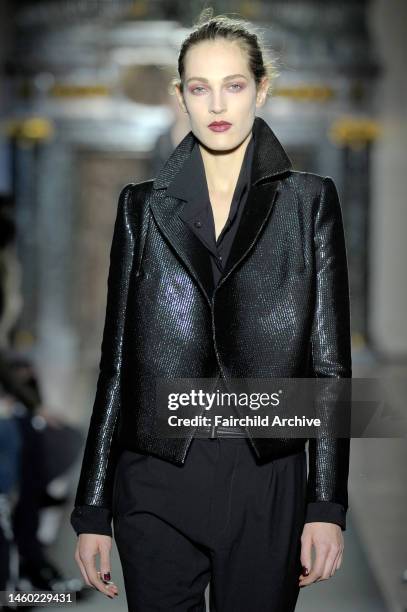 Model on the runway at Anthony Vaccarello's fall 2013 show at Hotel Salomon de Rothschild.