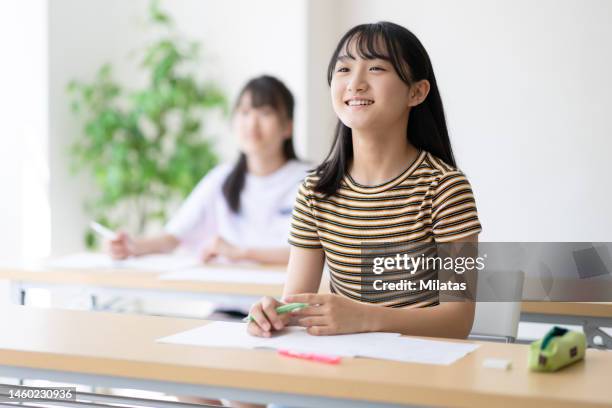 junior high school student in class - japan 12 years girl stock pictures, royalty-free photos & images