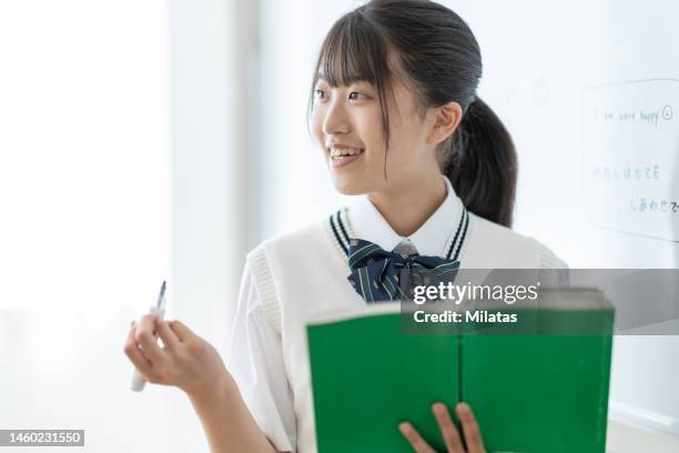 junior high school student in class - japan 12 years girl stock pictures, royalty-free photos & images