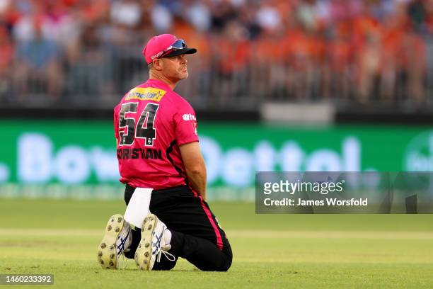 Dan Christian of the Sixers looks on after a miss field during the Men's Big Bash League match between the Perth Scorchers and the Sydney Sixers at...