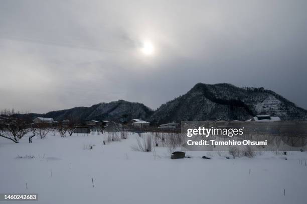 An window view is seen from Nagano Electric Railway's Snow Monkey Express train bound for Yutanaka Station, where is the nearest station to the...