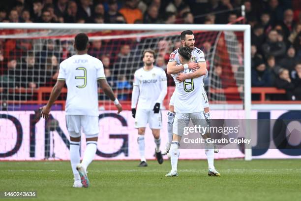 Jack Harrison of Leeds United celebrates with teammate Marc Roca after scoring the team's first goal during the Emirates FA Cup Fourth Round match...