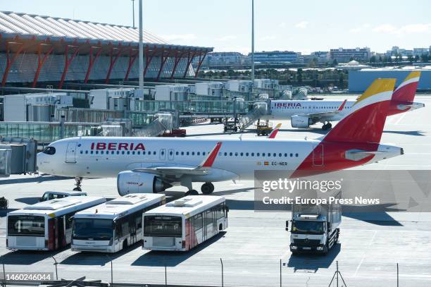 Iberia planes wait on the runway at Terminal 4 of Madrid-Barajas Adolfo Suarez Airport, Jan. 28 in Madrid, Spain. A crash in Iberia's systems today...