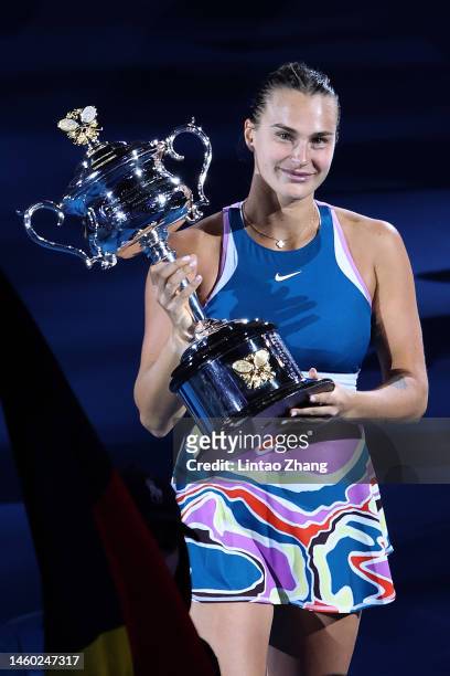 Aryna Sabalenka poses with the Daphne Akhurst Memorial Cup after winning the Women’s Singles Final match against Elena Rybakina of Kazakhstan during...
