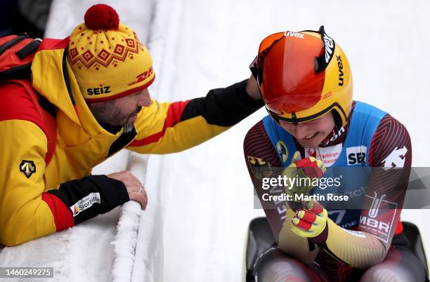 Julia Taubitz of Germany celebrate with coach Jan Eichhorn after winning the silver medal during the Women's Singles Run 2 during day 2 of the FIL...