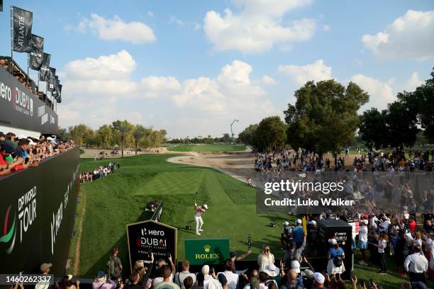 Tommy Fleetwood of England tees off on the 17th hole during the continuation of Round Two on Day Three of the Hero Dubai Desert Classic at Emirates...