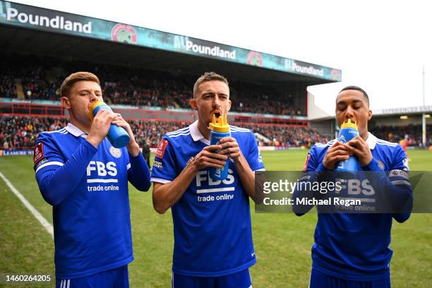 Harvey Barnes, Timothy Castagne and Youri Tielemans of Leicester City take a drink prior to the Emirates FA Cup Fourth Round match between Walsall...