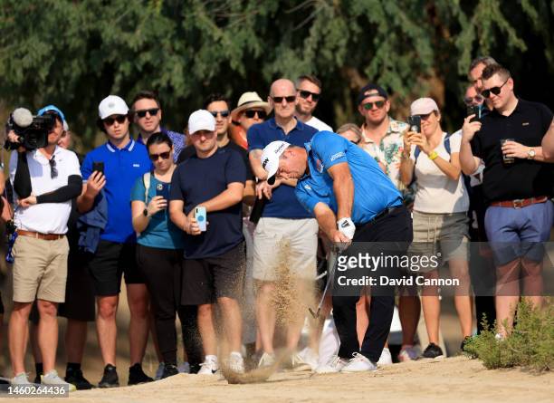 Ryan Fox of New Zealand plays his second shot on the 14th hole during the completion of the second round on Day Three of the Hero Dubai Desert...