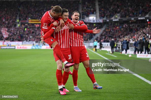 Michael Gregoritsch of SC Freiburg celebrates with teammates after scoring the team's first goal during the Bundesliga match between Sport-Club...