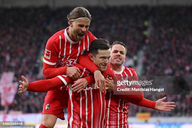 Michael Gregoritsch of SC Freiburg celebrates with teammates after scoring the team's first goal during the Bundesliga match between Sport-Club...