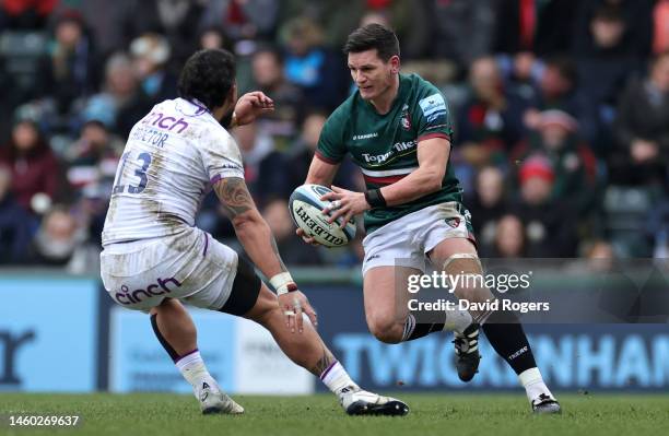 Freddie Burns of Leicester Tigers takes on Matt Proctor during the Gallagher Premiership Rugby match between Leicester Tigers and Northampton Saints...